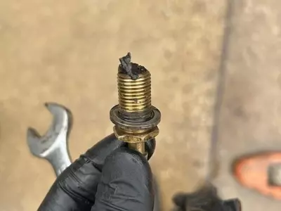 Fuel tank being drained and cleaned during industrial diesel hot pressure washer repair in Dover.